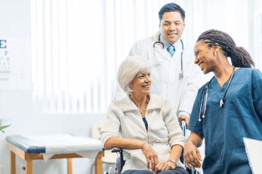 Doctors talking to patient